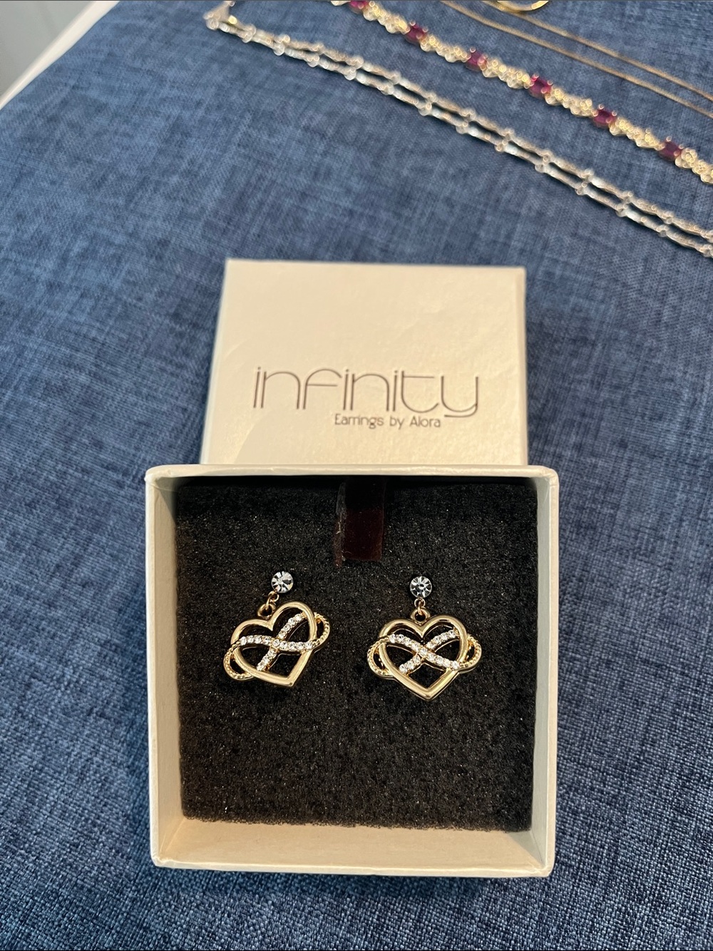 Earrings by Alora. Infinity loop